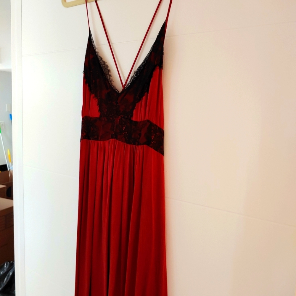 Red midi dress with black lace trim